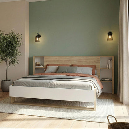 Modern bedroom with wooden bed, desk, and decor elements.